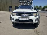 Mitsubishi L200 2014 года за 9 300 000 тг. в Алматы – фото 3