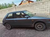 Mazda 323 1989 года за 750 000 тг. в Астана – фото 2