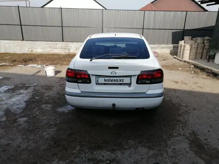 Mazda 626 1998 года за 2 300 000 тг. в Алматы – фото 4