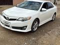 Toyota Camry 2013 года за 5 600 000 тг. в Жанаозен