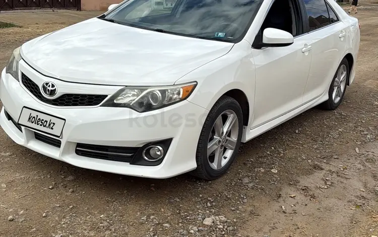 Toyota Camry 2013 года за 5 600 000 тг. в Жанаозен
