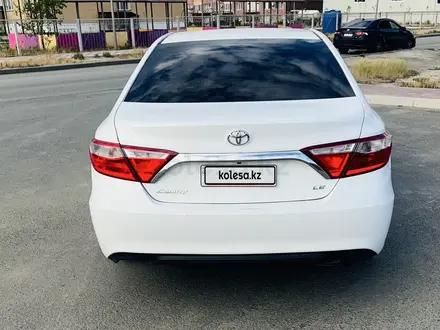 Toyota Camry 2015 года за 6 400 000 тг. в Атырау – фото 4