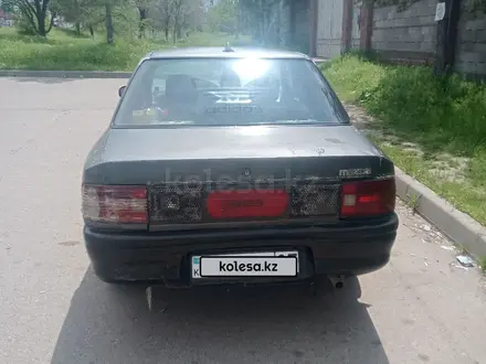 Mazda 323 1991 года за 600 000 тг. в Алматы – фото 4