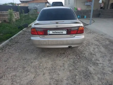 Mazda 323 1996 года за 1 800 000 тг. в Алматы – фото 5