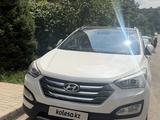Hyundai Santa Fe 2014 года за 9 300 000 тг. в Алматы
