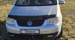 Volkswagen Touran 2003 годаүшін3 650 000 тг. в Новоишимский
