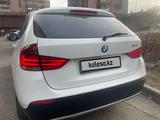 BMW X1 2010 года за 7 500 000 тг. в Алматы – фото 2