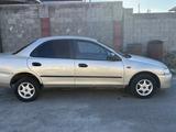 Mazda 323 1994 года за 1 250 000 тг. в Туркестан – фото 2