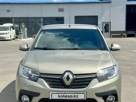 Renault Logan 2018 года за 2 750 000 тг. в Уральск – фото 2