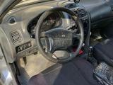 Mitsubishi Carisma 1997 года за 500 000 тг. в Уральск – фото 4