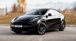 Tesla Model Y 2023 года за 17 300 000 тг. в Алматы – фото 2