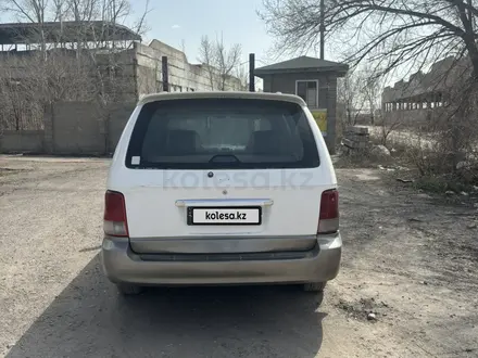 Kia Carnival 2001 года за 2 500 000 тг. в Астана – фото 4