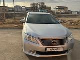 Toyota Camry 2014 года за 10 500 000 тг. в Жанаозен