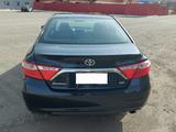 Toyota Camry 2017 года за 10 200 000 тг. в Актобе – фото 4