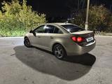 Chevrolet Cruze 2011 года за 3 100 000 тг. в Караганда – фото 4