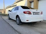 Toyota Corolla 2013 года за 6 300 000 тг. в Шымкент – фото 4