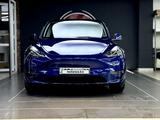 Tesla Model Y 2021 года за 16 900 000 тг. в Алматы – фото 2