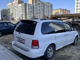 Kia Carnival 2002 года за 2 150 000 тг. в Астана – фото 4