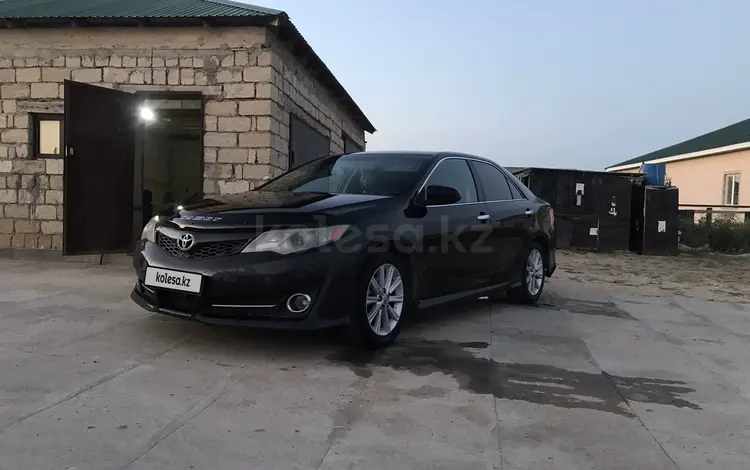 Toyota Camry 2013 года за 7 200 000 тг. в Атырау