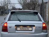 Mazda 323 1998 года за 850 000 тг. в Алматы – фото 2