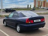 Mitsubishi Carisma 1998 года за 1 200 000 тг. в Астана – фото 4
