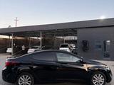 Hyundai Elantra 2014 года за 3 900 000 тг. в Атырау – фото 4