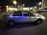 Mitsubishi Lancer 2009 года за 2 300 000 тг. в Астана – фото 4