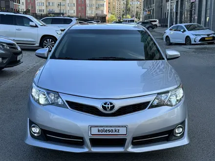 Toyota Camry 2014 года за 6 700 000 тг. в Атырау