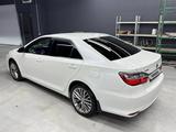 Toyota Camry 2015 года за 10 350 000 тг. в Астана