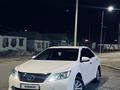 Toyota Camry 2013 года за 7 600 000 тг. в Атырау