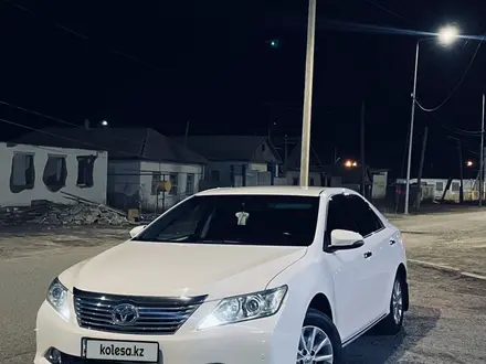 Toyota Camry 2013 года за 7 600 000 тг. в Атырау