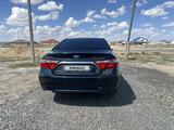 Toyota Camry 2016 года за 9 250 000 тг. в Атырау – фото 4