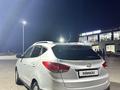 Hyundai Tucson 2012 года за 5 700 000 тг. в Актобе – фото 2