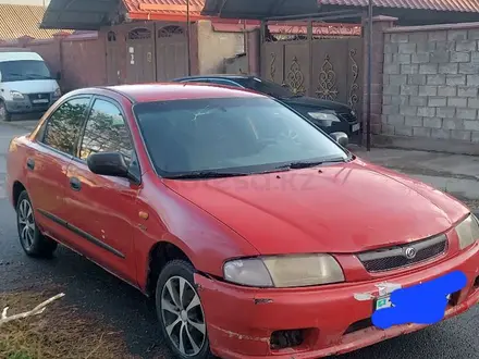 Mazda 323 1998 годаүшін600 000 тг. в Шымкент – фото 2