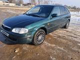 Mazda 323 1998 года за 2 000 000 тг. в Кулан – фото 3