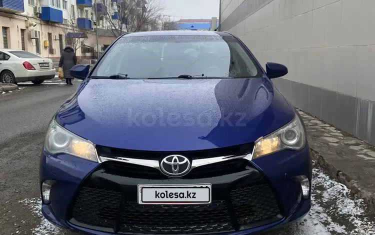 Toyota Camry 2015 года за 6 800 000 тг. в Атырау