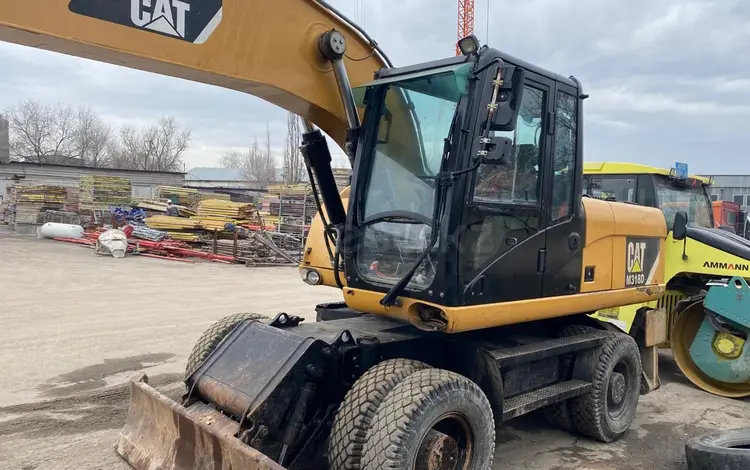 Caterpillar  M318D 2012 года за 31 000 000 тг. в Алматы