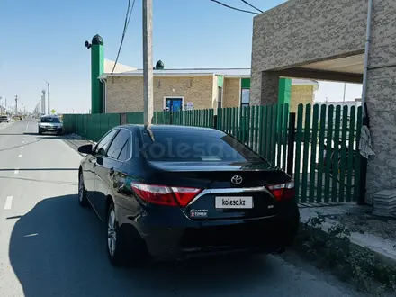 Toyota Camry 2015 года за 9 300 000 тг. в Атырау – фото 24