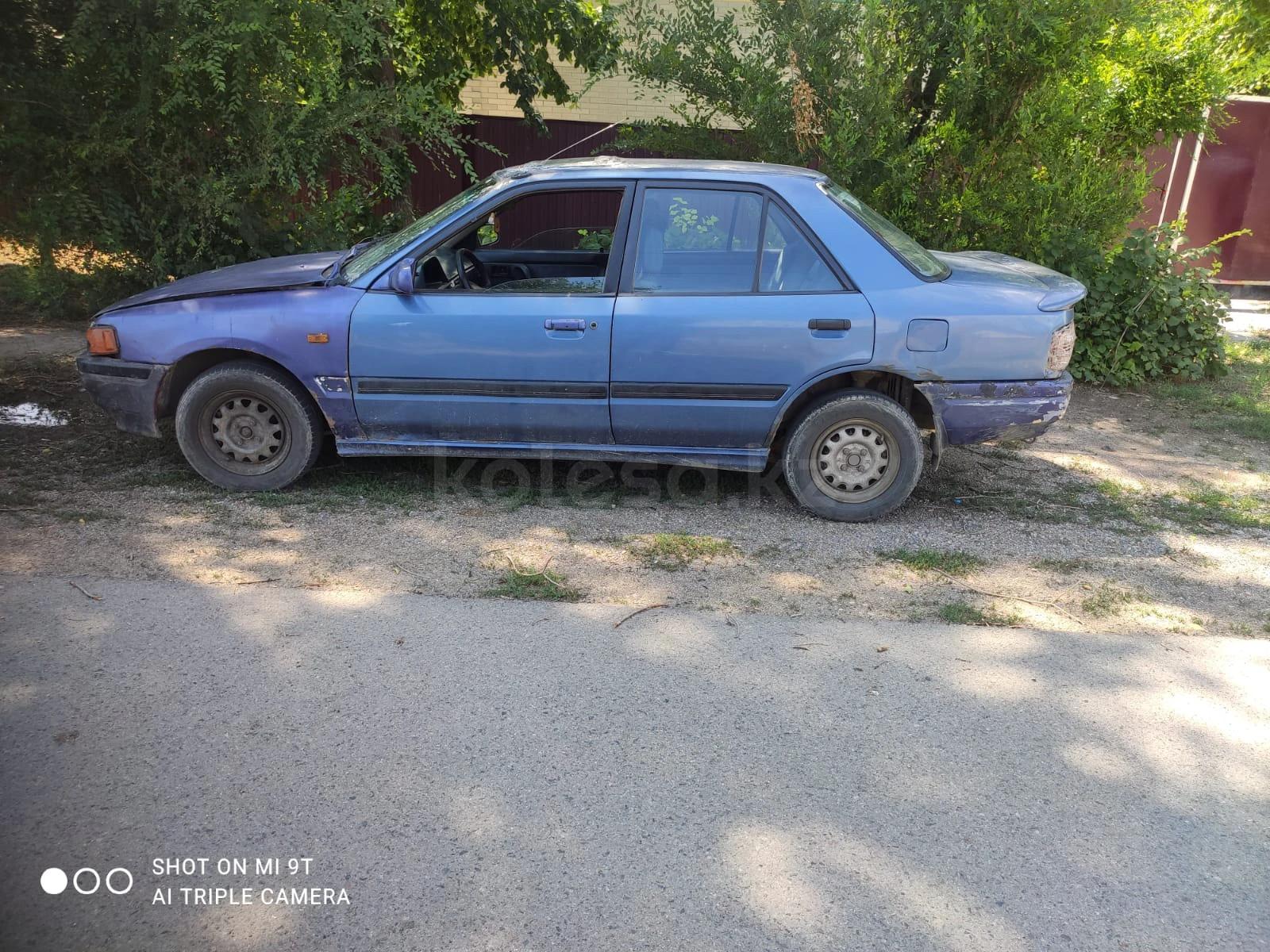 Mazda 323 1991 г.