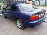 Mazda 323 1995 годаүшін1 150 000 тг. в Алматы – фото 4
