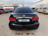 Nissan Almera 2014 года за 3 529 800 тг. в Астана – фото 2