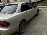 Mazda Familia 1995 года за 1 200 000 тг. в Алтай – фото 4