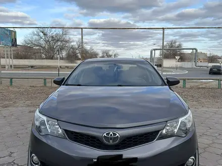 Toyota Camry 2014 года за 5 900 000 тг. в Байконыр