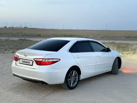 Toyota Camry 2015 года за 8 000 000 тг. в Жанаозен – фото 2