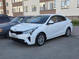Kia Rio 2021 года за 6 490 000 тг. в Астана