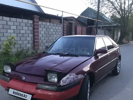 Mazda 323 1993 года за 550 000 тг. в Алматы – фото 4