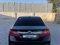 Toyota Camry 2013 годаfor8 700 000 тг. в Актау