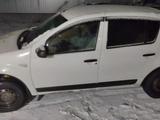 Renault Sandero 2013 года за 2 500 000 тг. в Трекино – фото 3