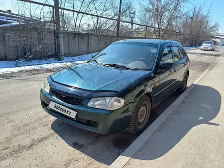 Mazda 323 1999 года за 1 400 000 тг. в Алматы – фото 2