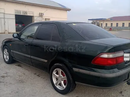 Mazda 626 1998 года за 1 400 000 тг. в Актау